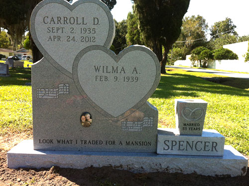 Grey granite double heart monument with a portrait and a separate married years block